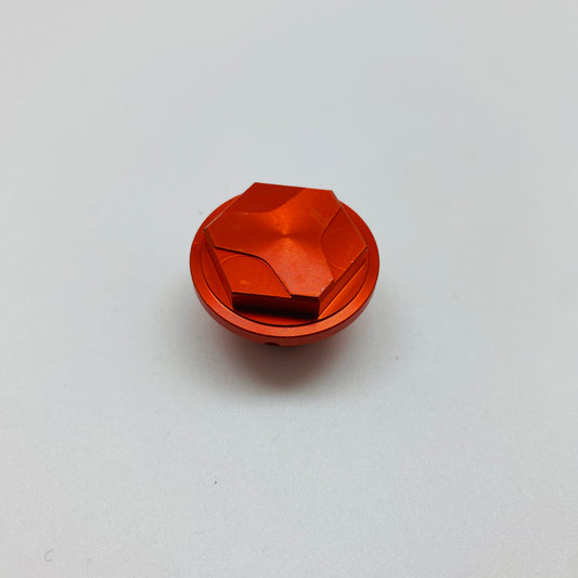 Takajarrun nestesäiliön korkki – Oranssi